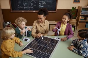 black woman showing solar panel to group of childr 2024 02 02 04 09 12 utc